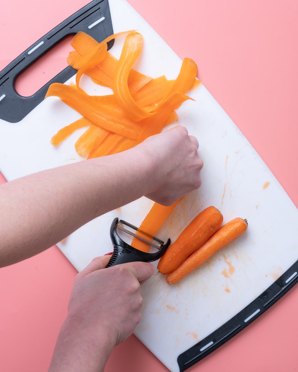 peeling the carrots