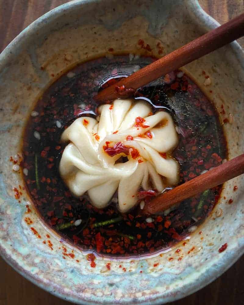 vegan shiitake dumplings in dipping sauce