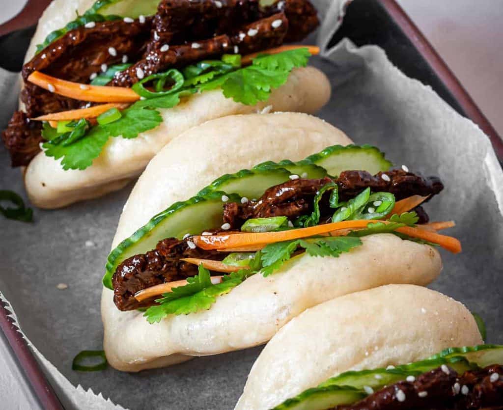 three delicious vegan bao buns