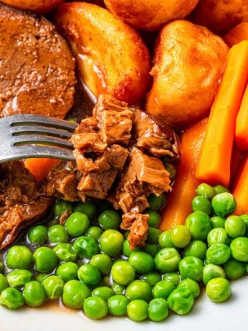 vegan beef made from seitan on a plate with peas