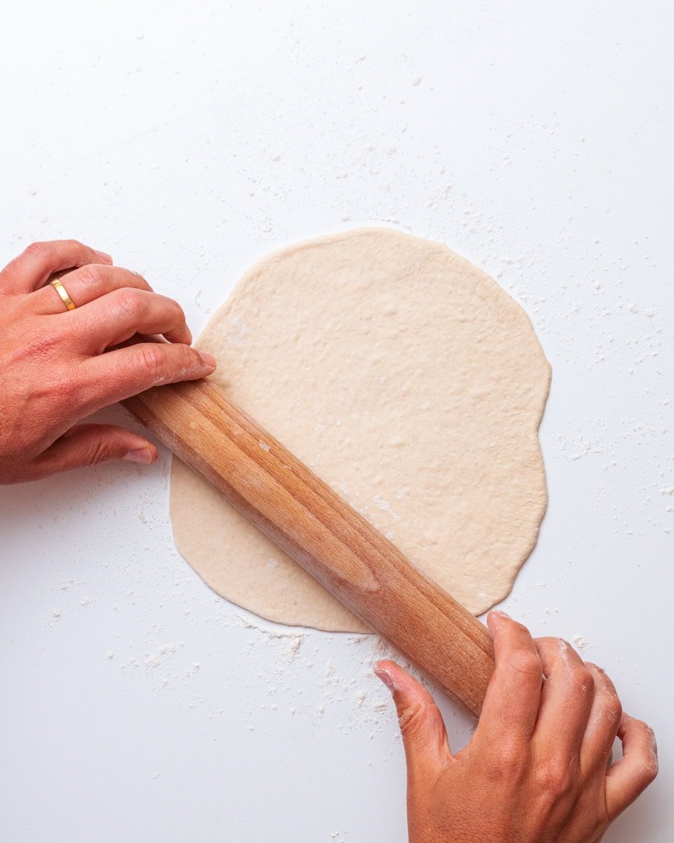 rolling vegan greek pita dough