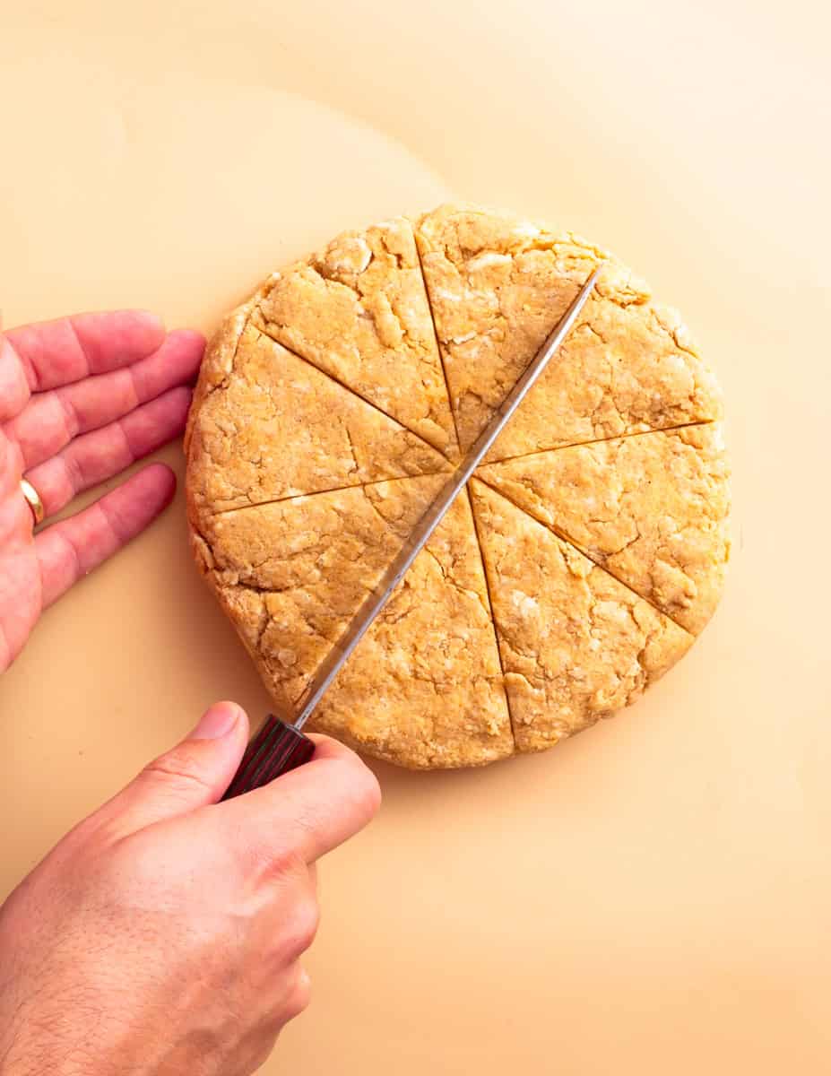 Slicing up the vegan pumpkin scone dough