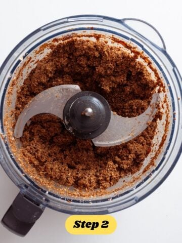 The filling for the vegan sausage rolls being blended in a food processor. 