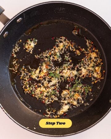 The aromatic ingredients for the recipe being fried