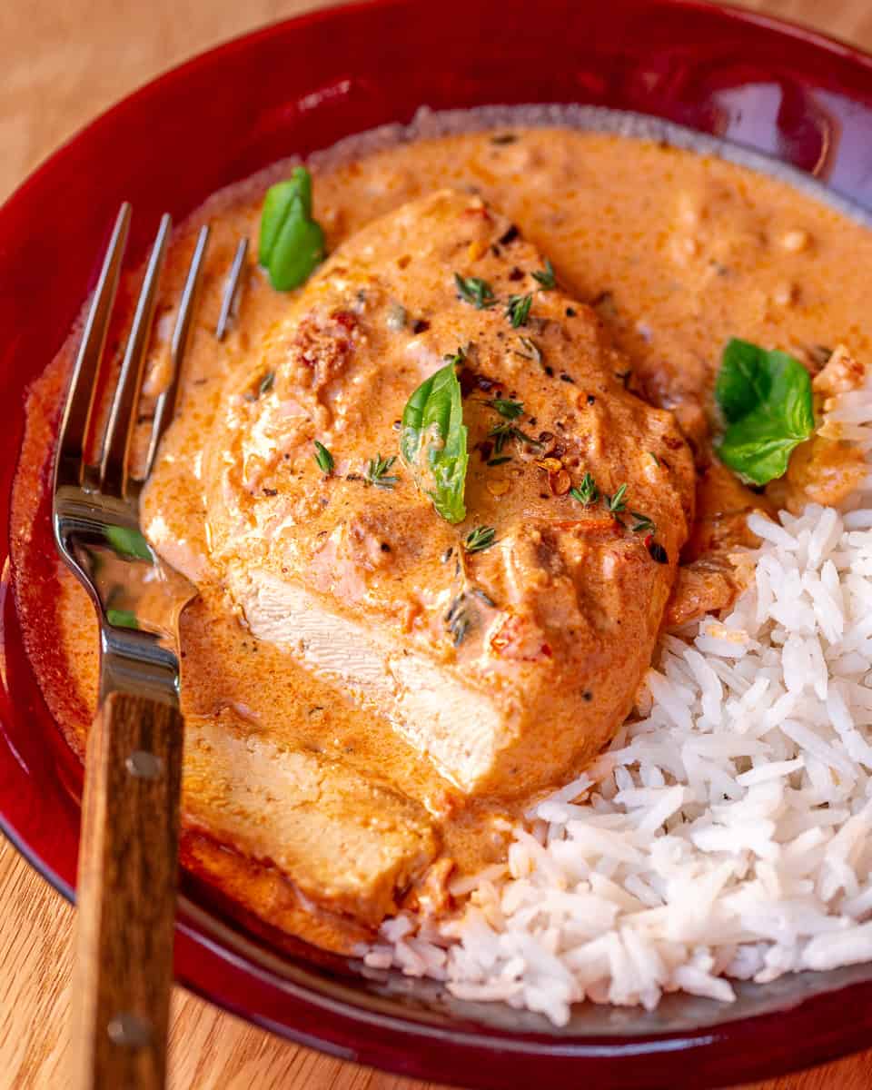 A sliced tofu cutlet in marry me tofu sauce