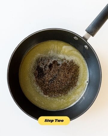 Step 2 of the recipe which requires toasting the black pepper